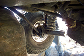 Tree strap holding control arm